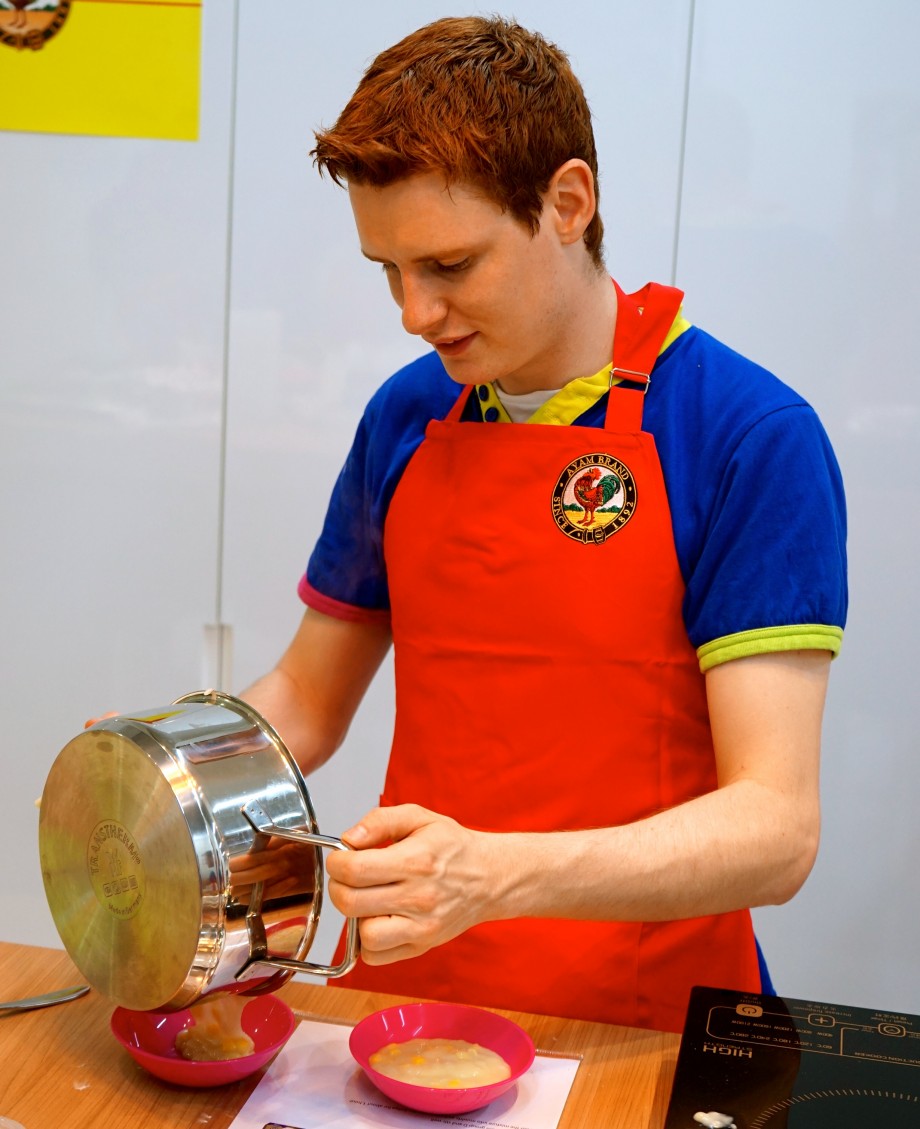 Pouring Corn Kueh Mixture into moulds - AspirantSG