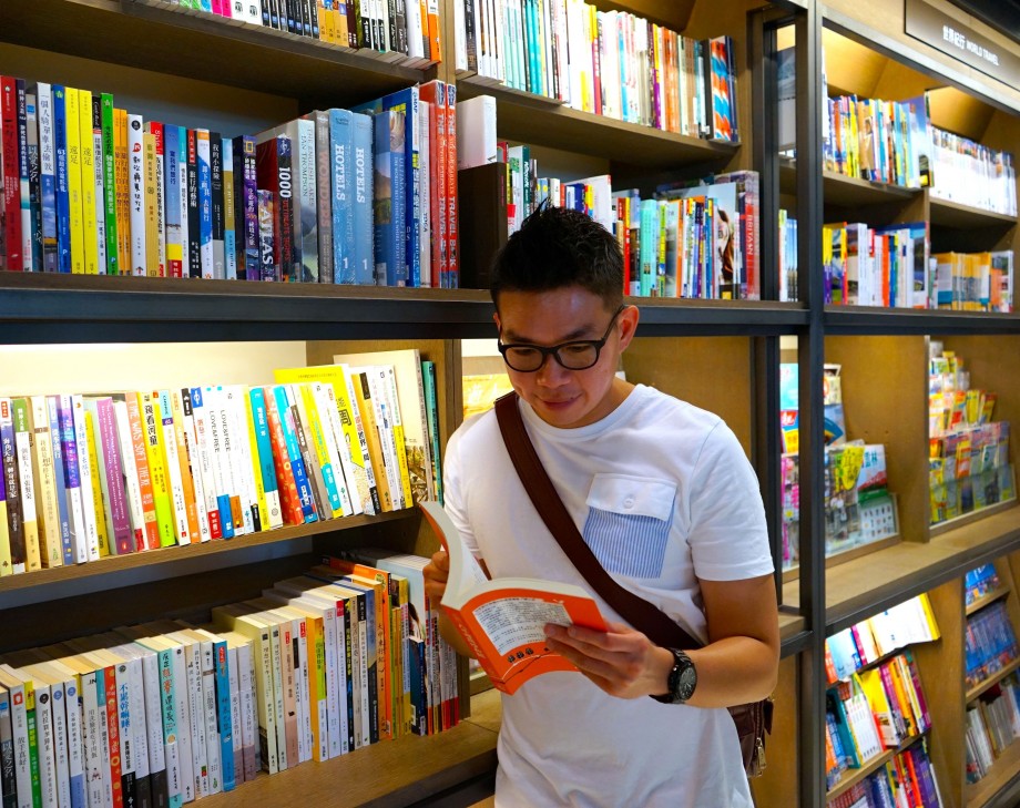 Reading Indoor with Transitions Lenses - AspirantSG